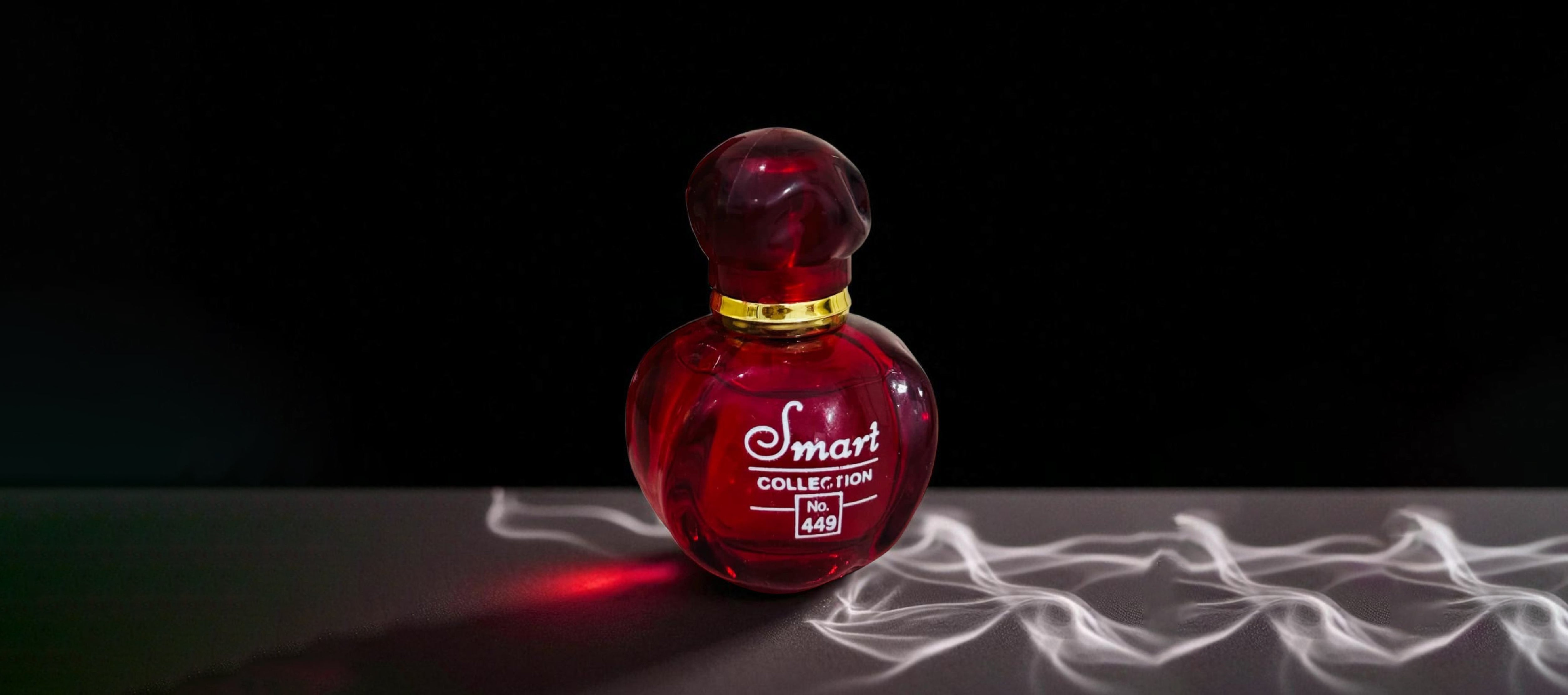 Red perfume bottle labeled 'Smart Collection No. 449' on a dark background