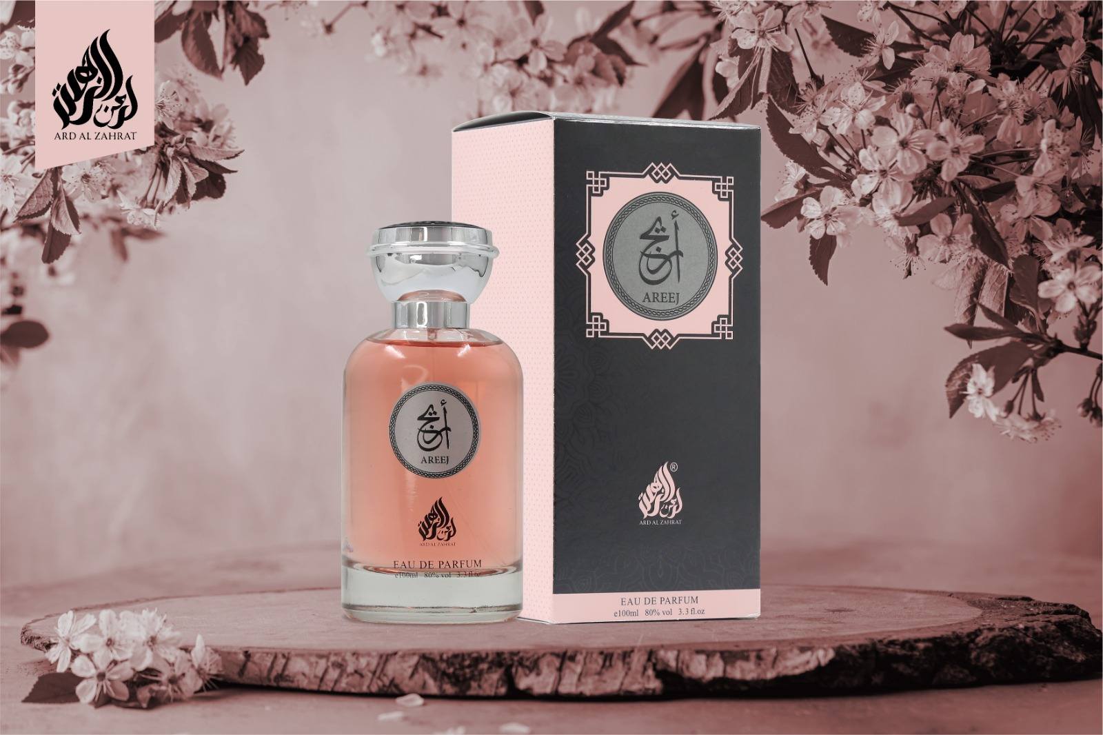 Perfume bottle and packaging with floral background