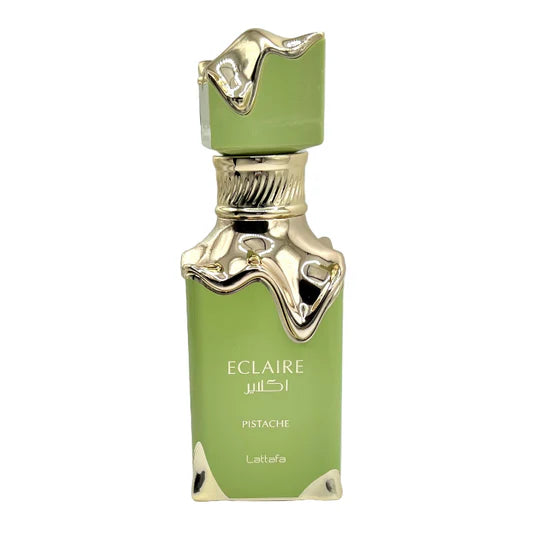 Green and gold perfume bottle labeled 'Eclaire Pistache' on a white background