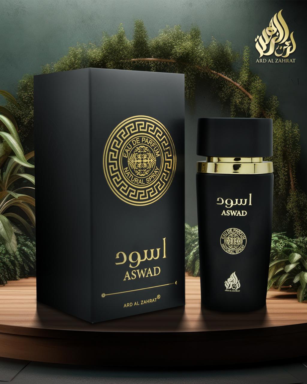 ASWAD perfume bottle and packaging with a green foliage background