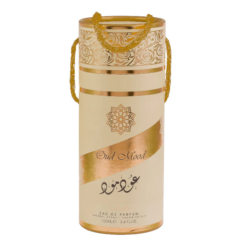Eau de Parfum bottle with decorative packaging on a white background