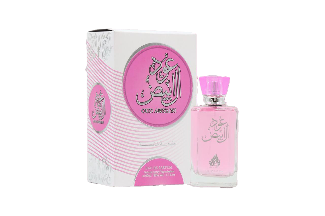 Pink perfume bottle with matching packaging on a white background