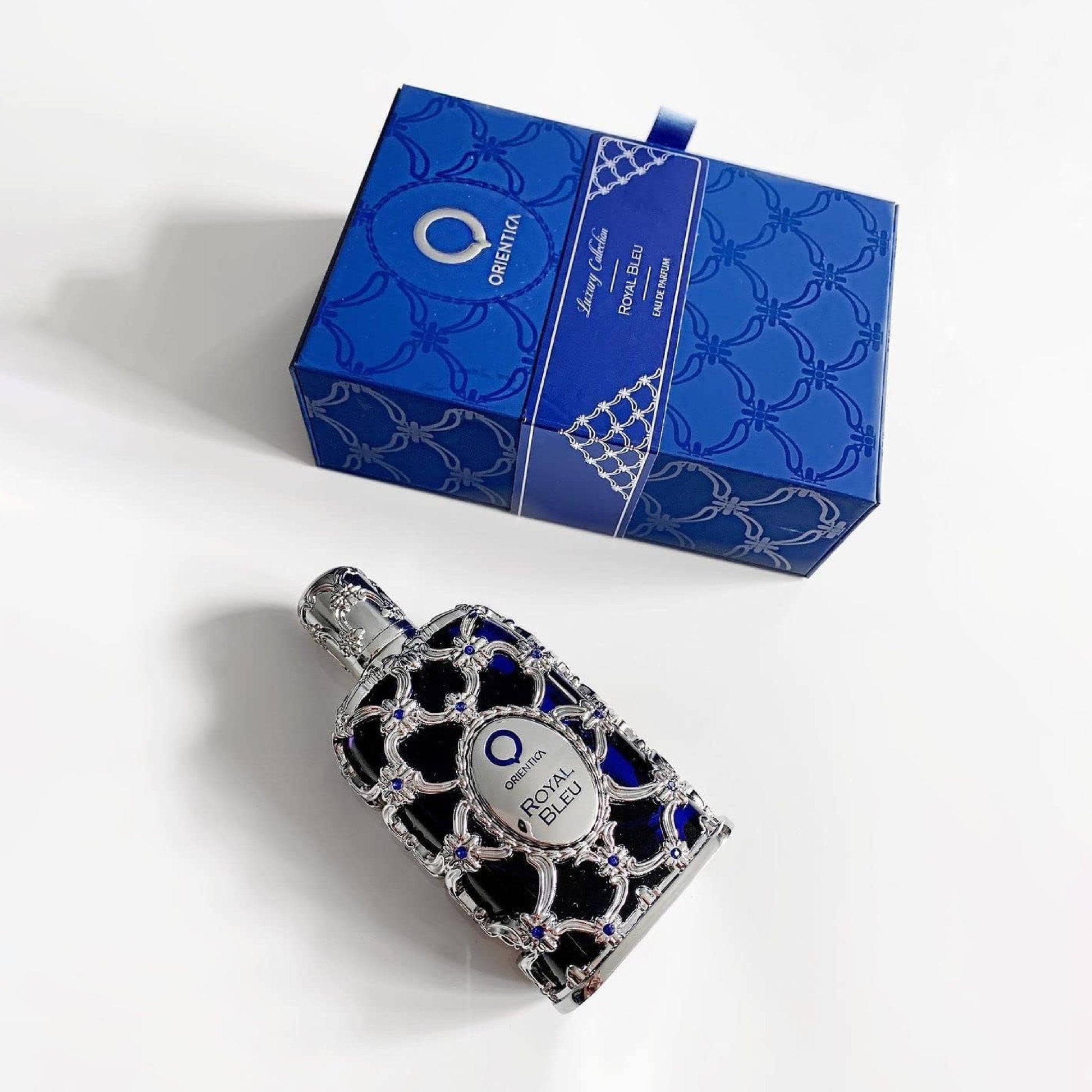 Oriflame Royal Blue perfume bottle with packaging on a white background