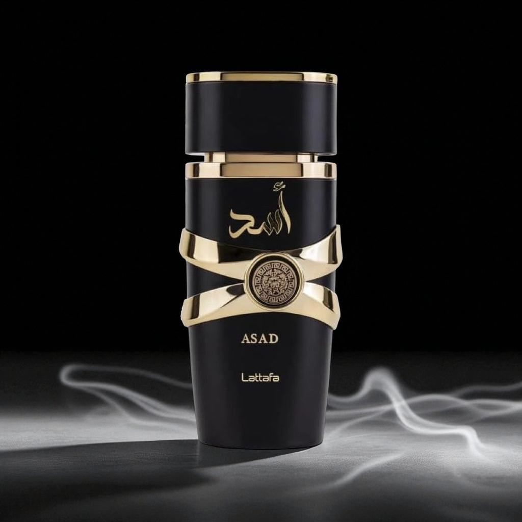 Black and gold perfume bottle with 'Lattafa' branding on a dark background