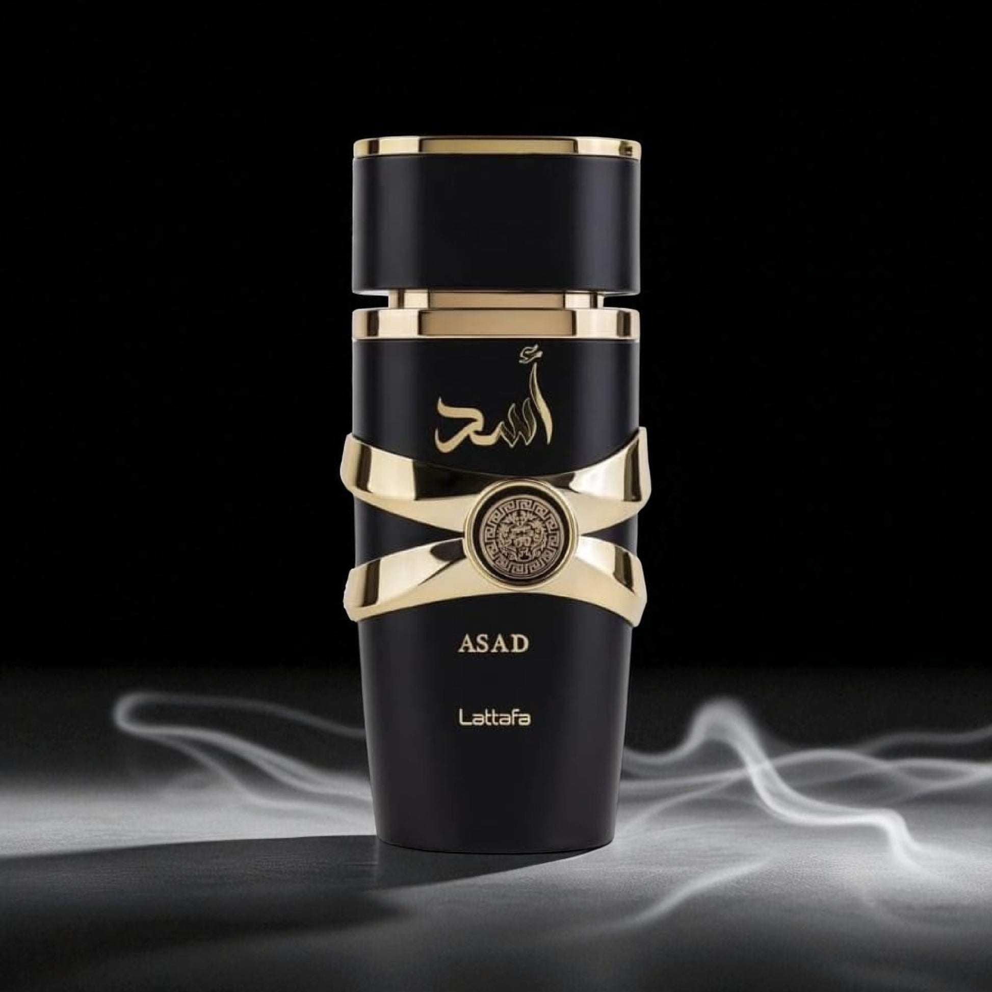 Black and gold perfume bottle with 'Lattafa' branding on a dark background