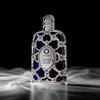 Decorative bottle labeled 'Oriental Royal Bleu' on a black background