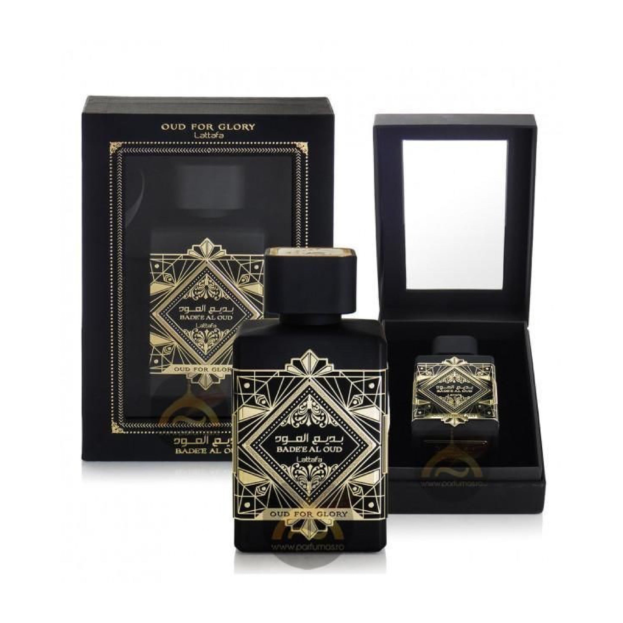 Black and gold perfume bottle with packaging on a white background