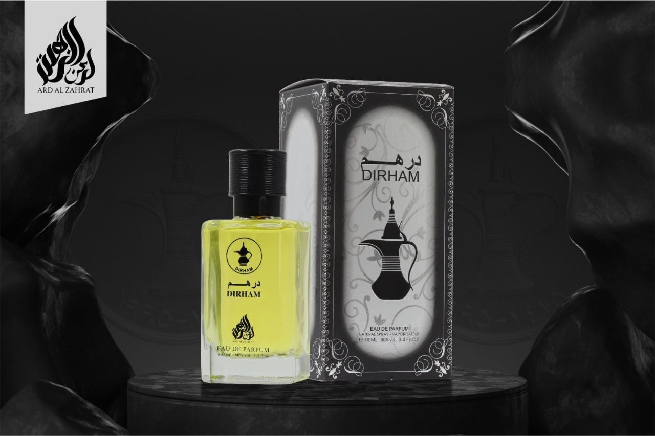 Dirham perfume bottle and packaging on a dark background