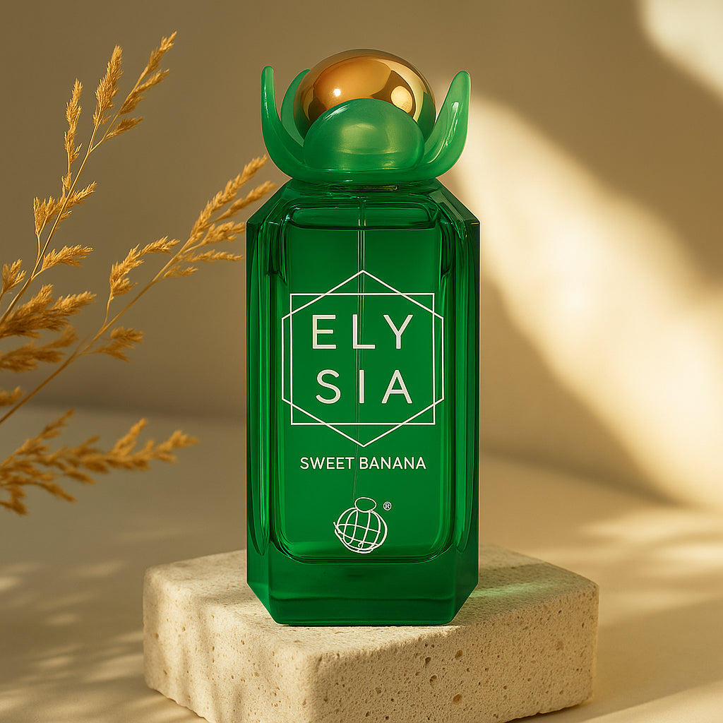 Green perfume bottle labeled 'Elysia Sweet Banana' on a beige background with dried grasses.