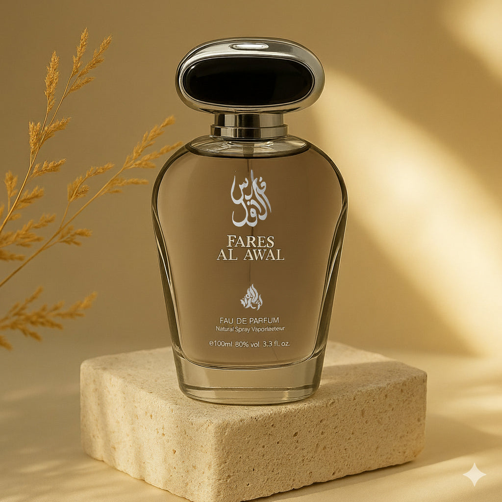 Perfume bottle labeled 'Fares Al Awal' on a beige platform with a blurred natural background