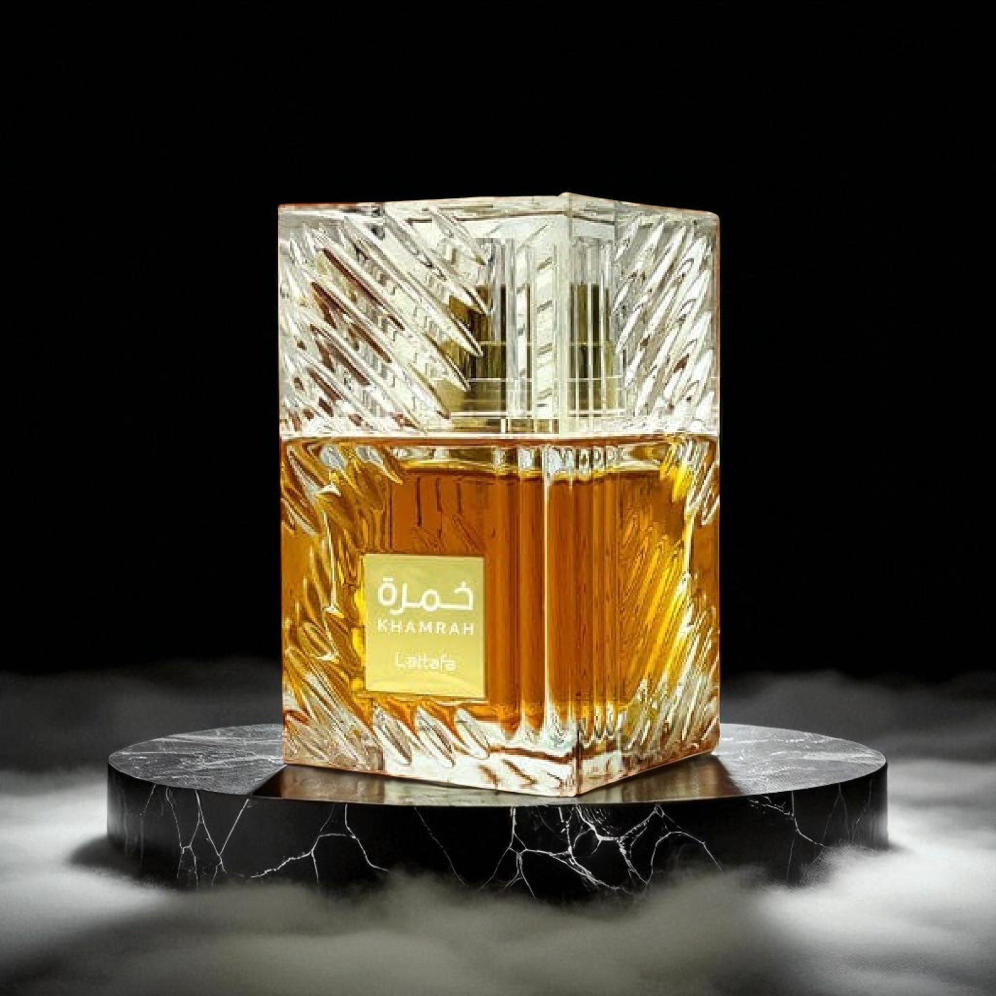 Perfume bottle with intricate design on a dark background