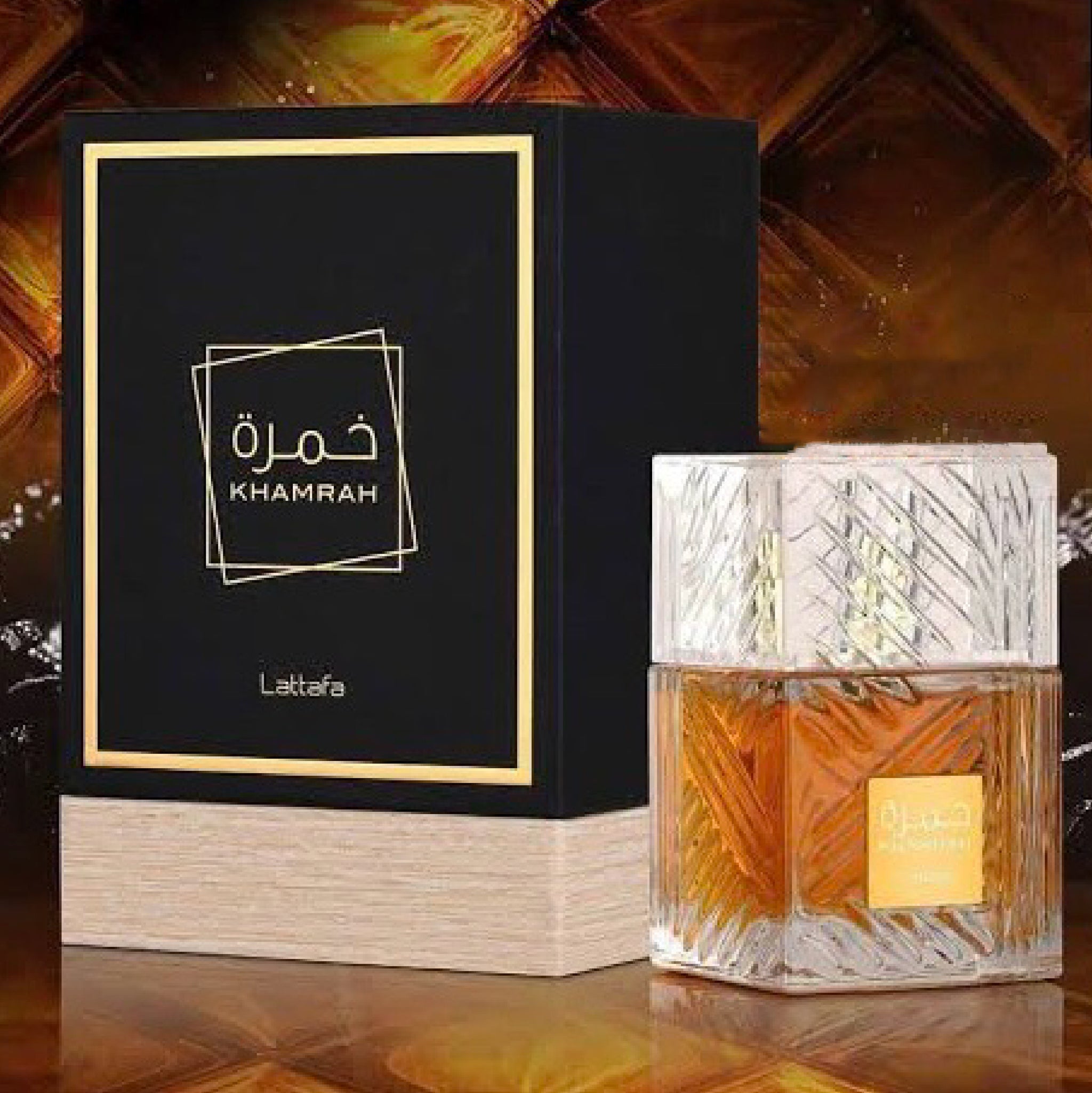 Khamrah perfume bottle and packaging on a wooden background