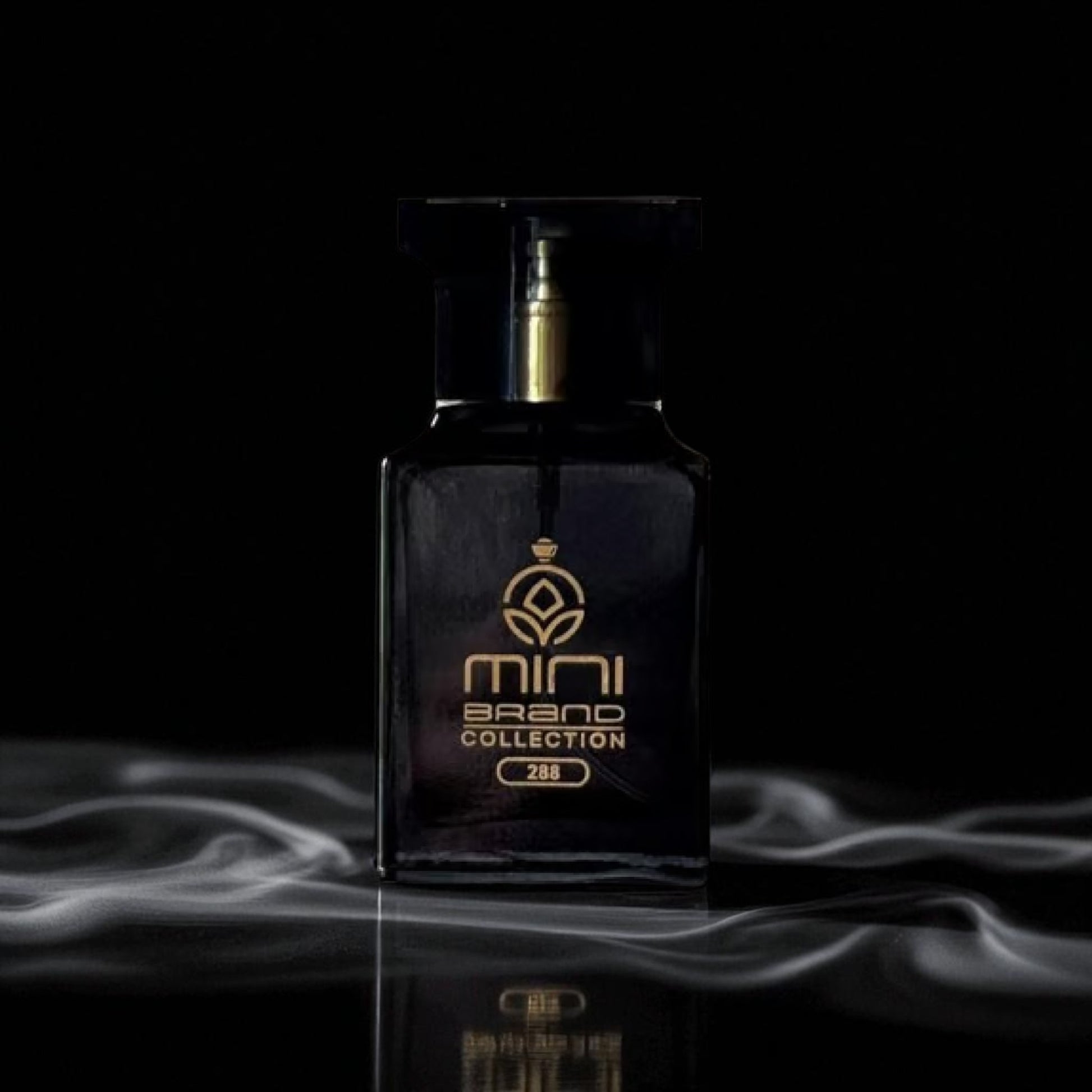 Black perfume bottle with gold accents on a dark background