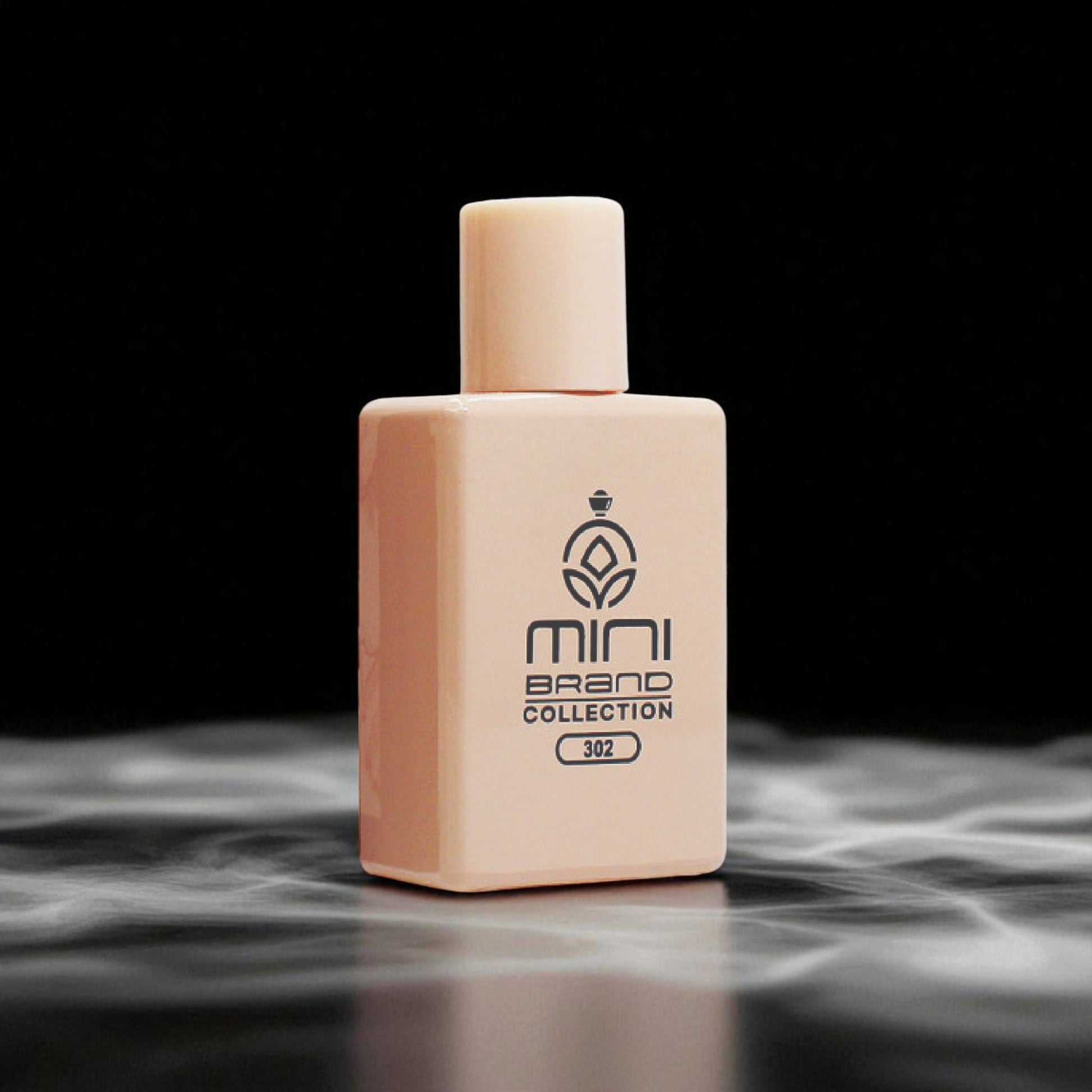 Beige perfume bottle with 'mini brand collection' label on a dark background