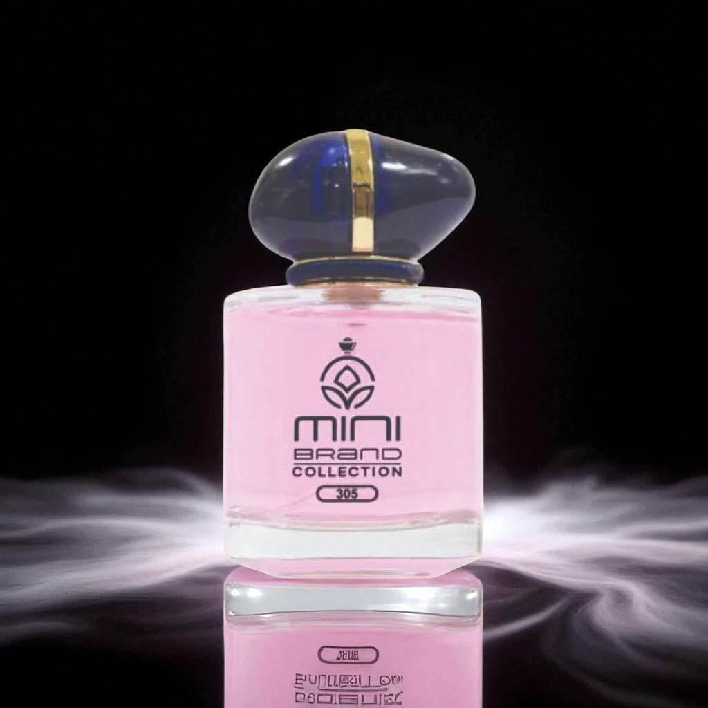 Pink perfume bottle with a gold cap on a reflective surface against a dark background