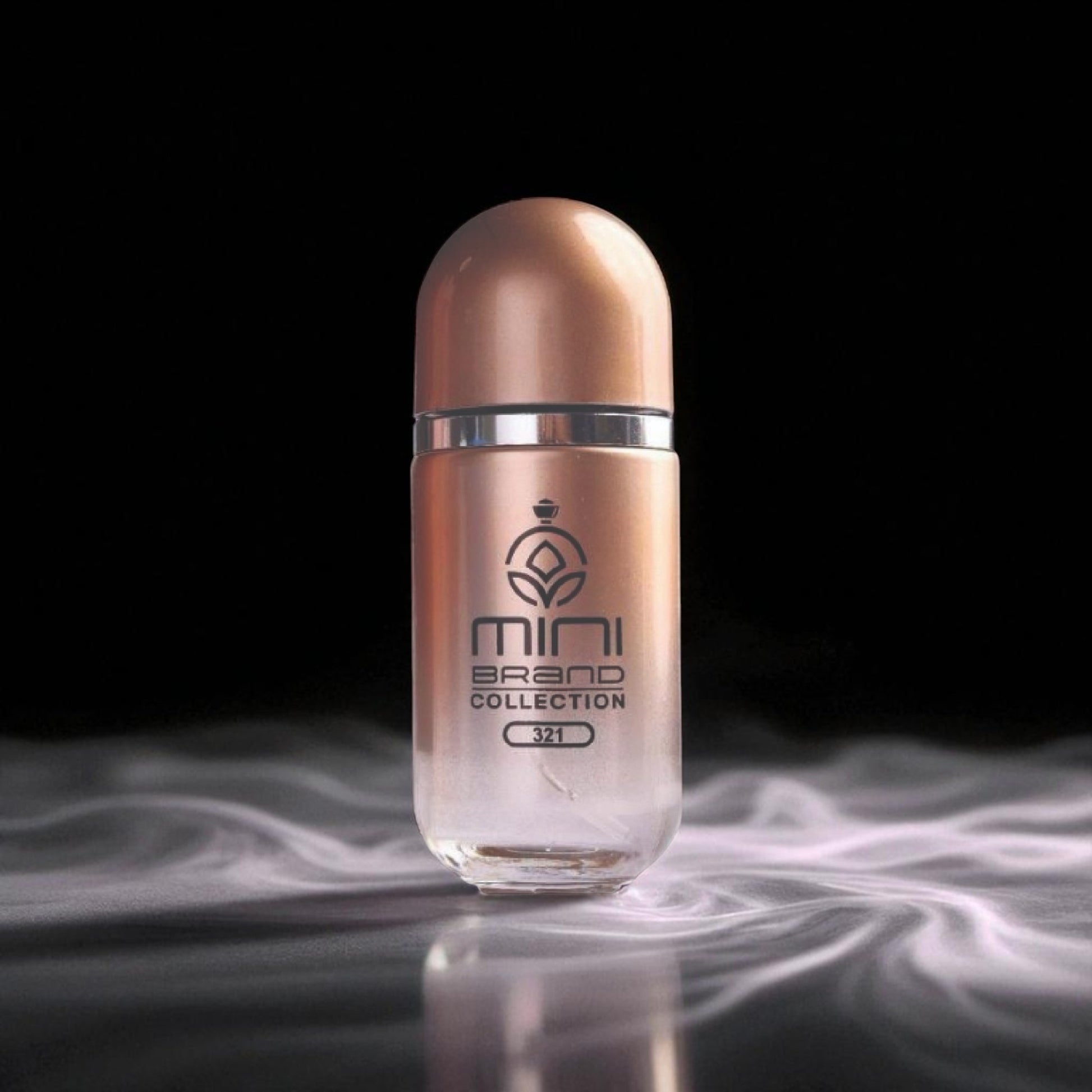Bronze-colored bottle with 'mini brand collection' branding on a dark background