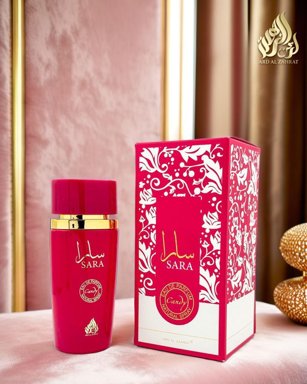 Red perfume bottle and box with 'Sara' branding on a pink background