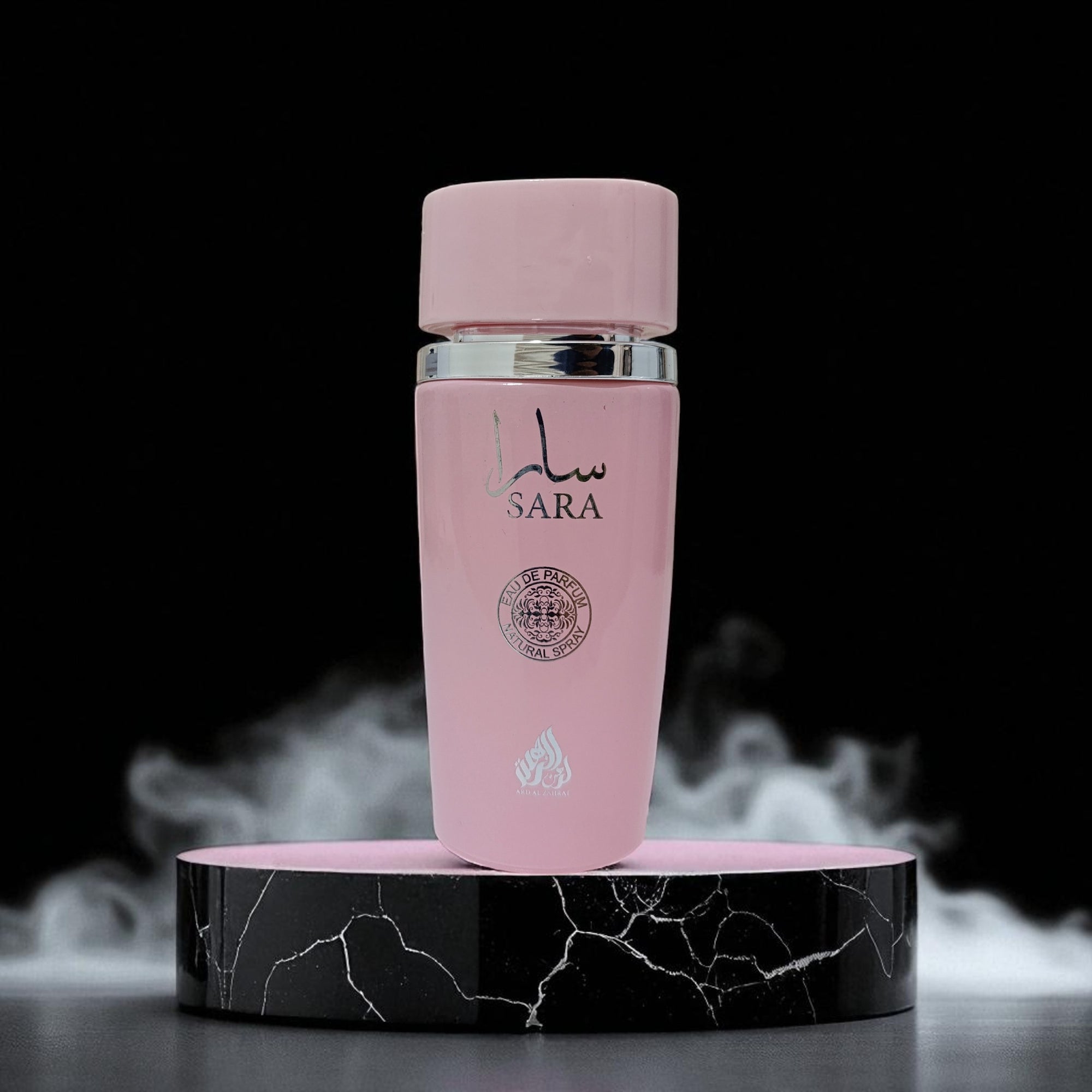 Pink bottle labeled 'Sara' on a black and white cracked platform with a black background