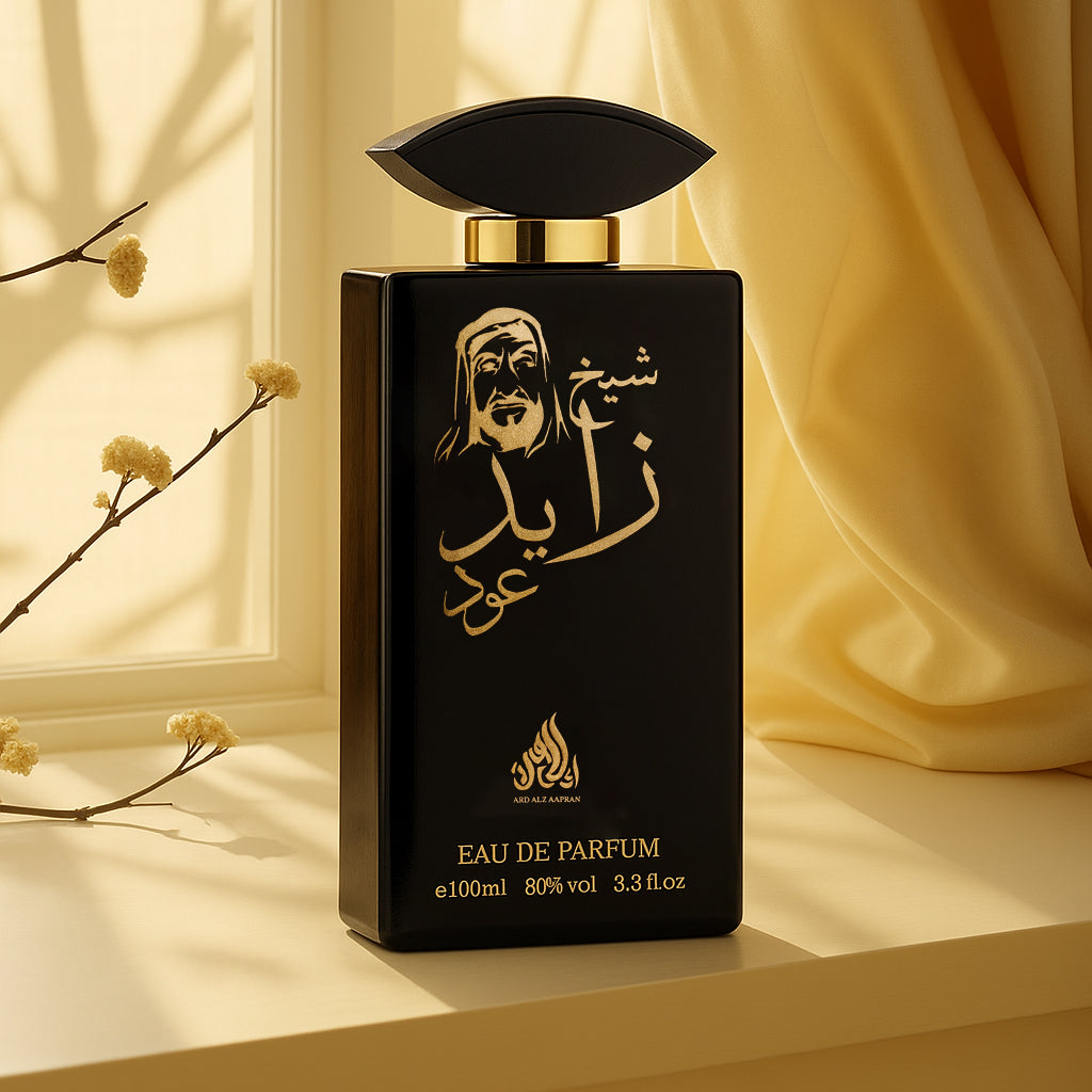 Black Eau de Parfum bottle with gold accents on a beige background