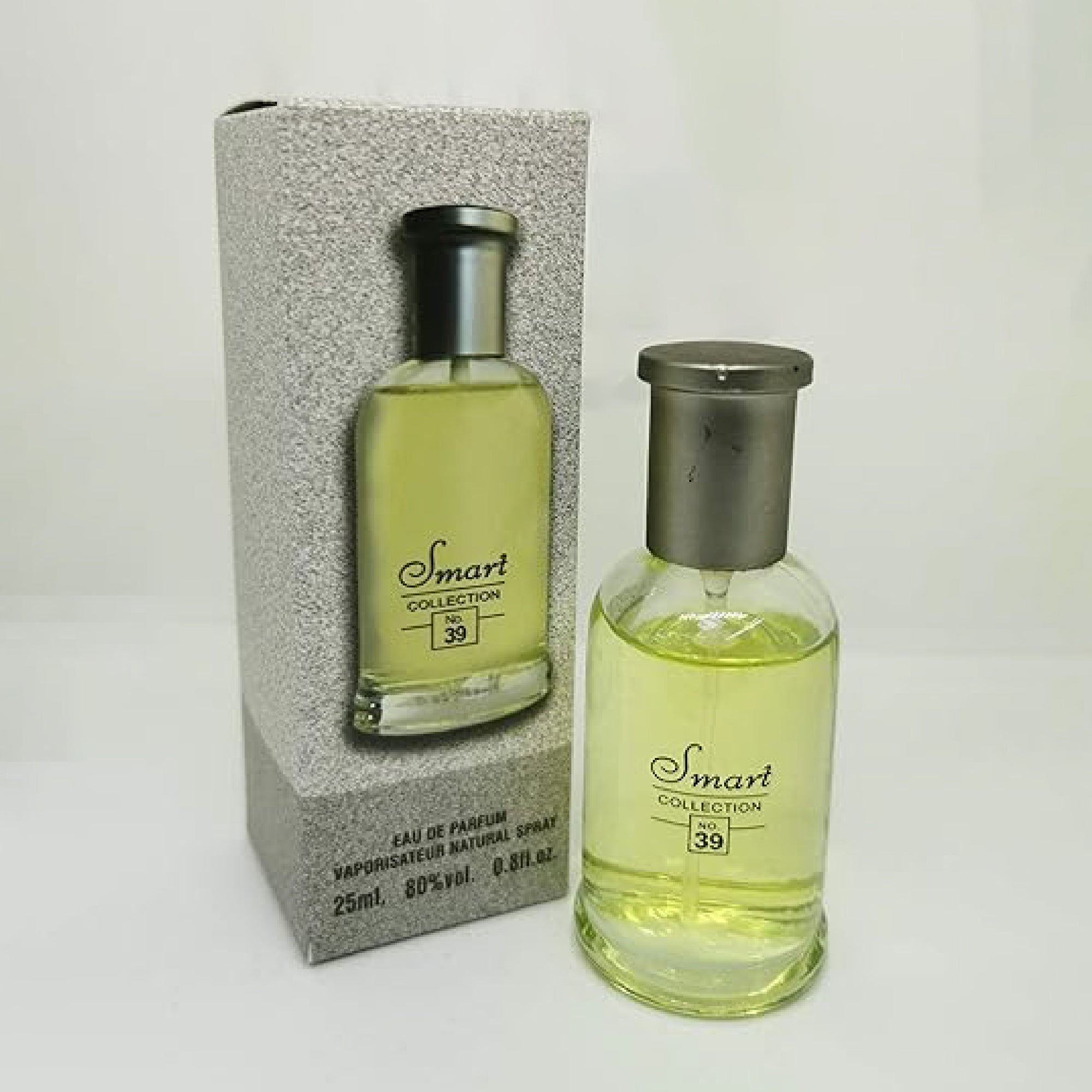 Perfume bottle with silver cap and 'Smart Collection' label next to its packaging on a white background