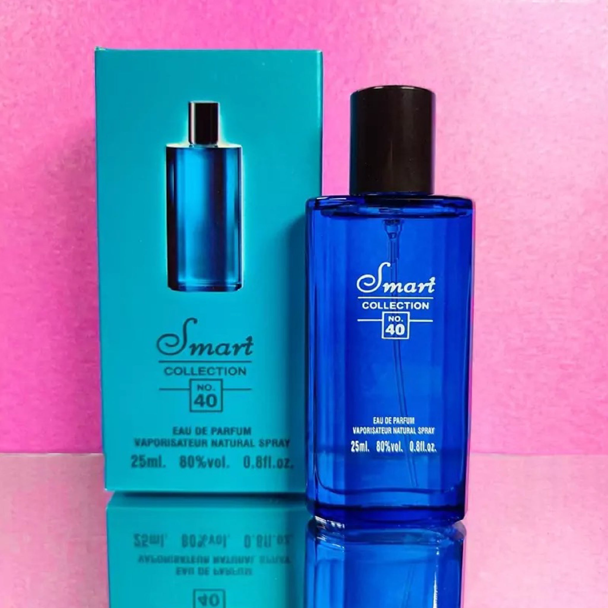 Blue perfume bottle and packaging with 'Smart Collection' branding on a pink background