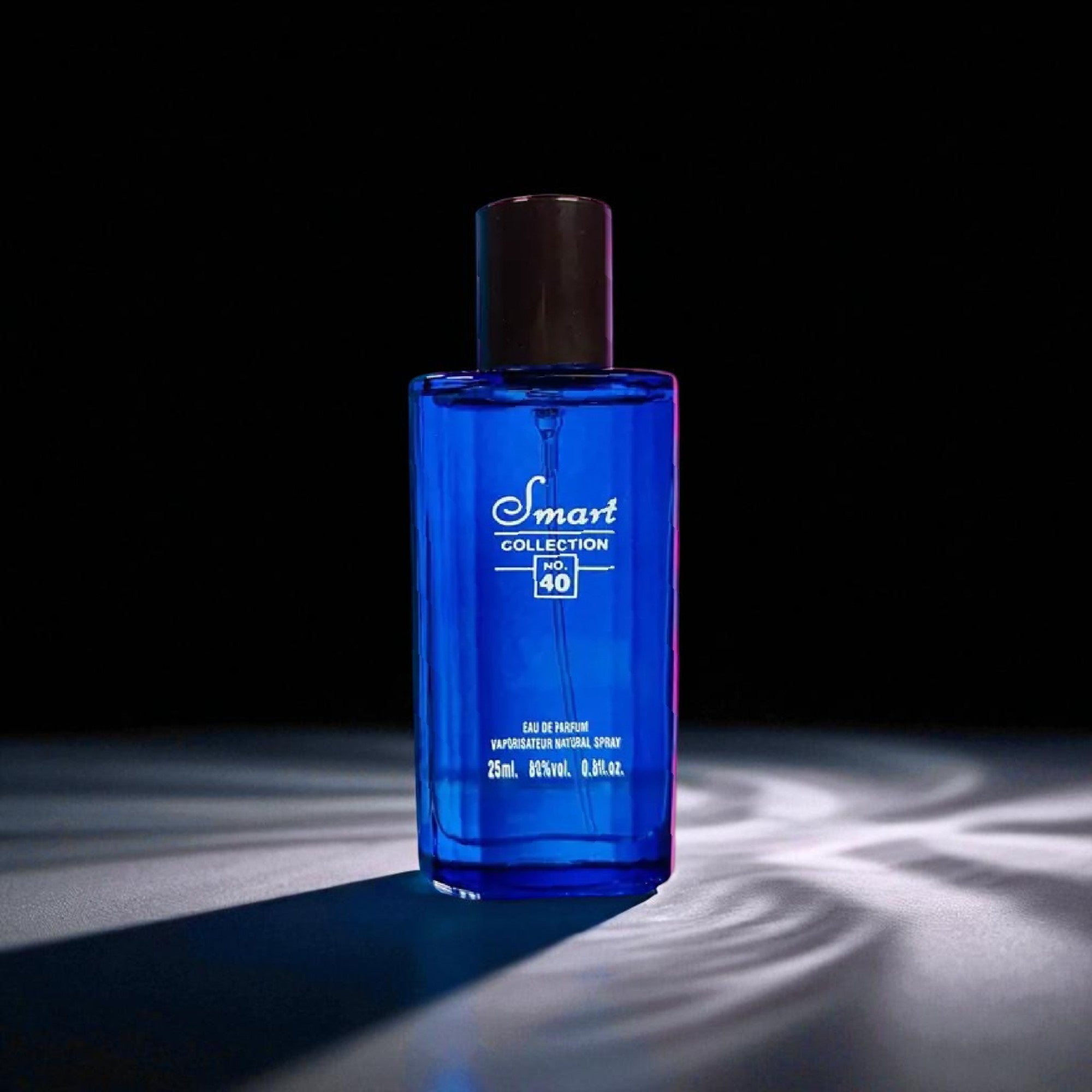 Blue perfume bottle with 'Smart Collection' label on a dark background