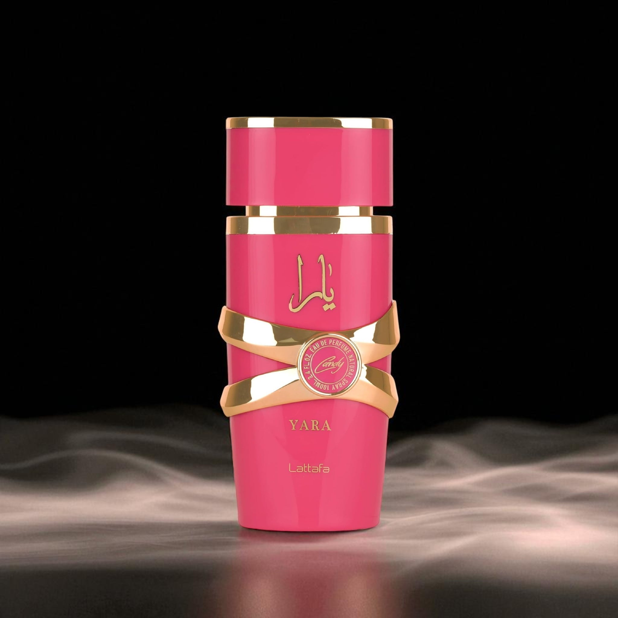 Pink and gold perfume bottle with 'Yara' branding on a dark background