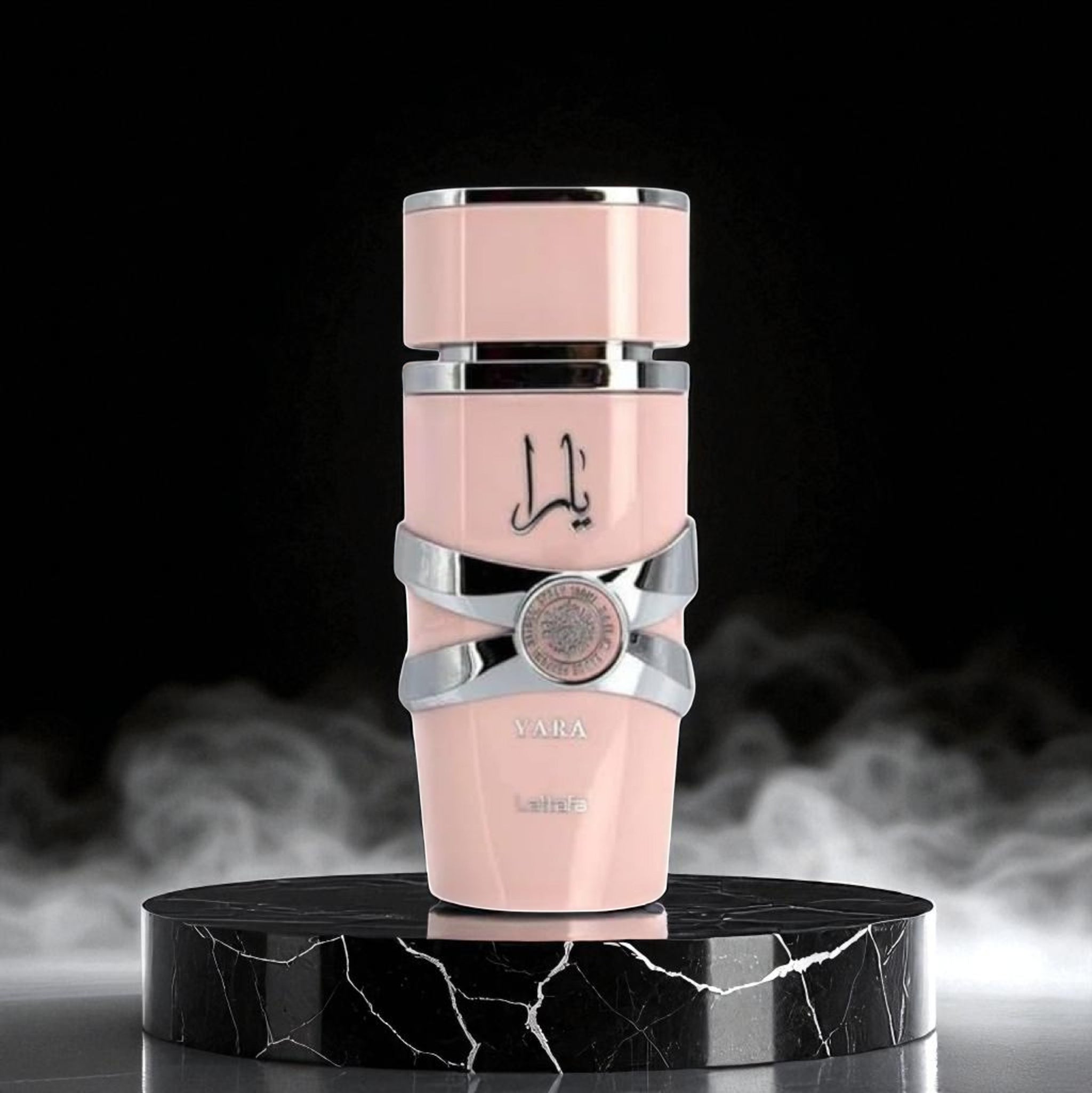 Pink and silver cosmetic product on a black marble stand with a dark background