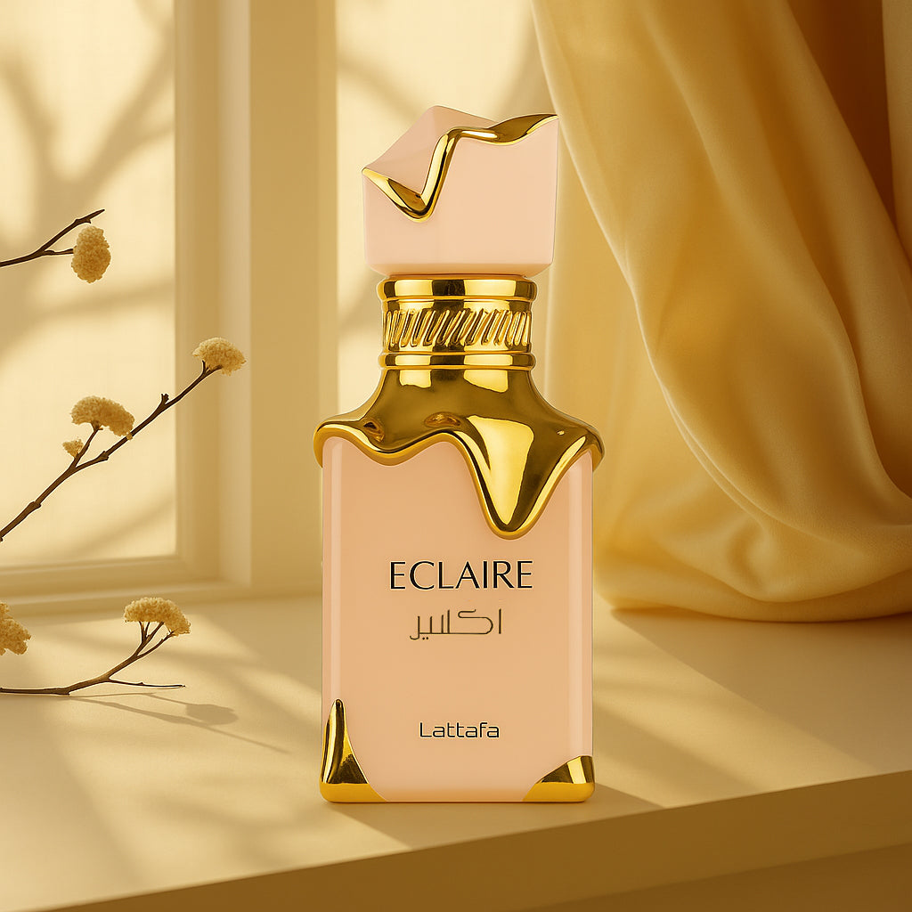 Lataafa Eclaire perfume bottle on a beige background with flowers and draped fabric.