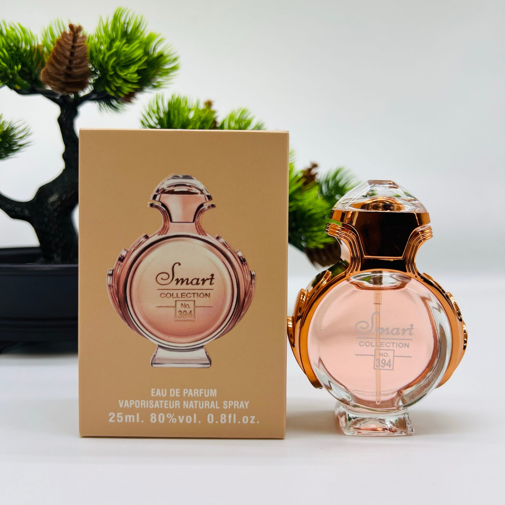 Perfume bottle and packaging with 'Smart Collection' branding on a light background.