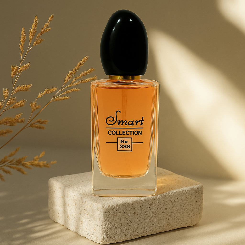 Perfume bottle labeled 'Smart Collection No 388' on a stone platform with dried grasses.